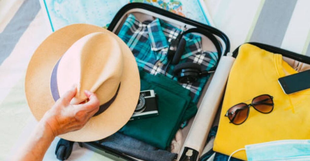 Stress-free travel packing concept with neatly arranged essentials using the 5-4-3-2-1 rule