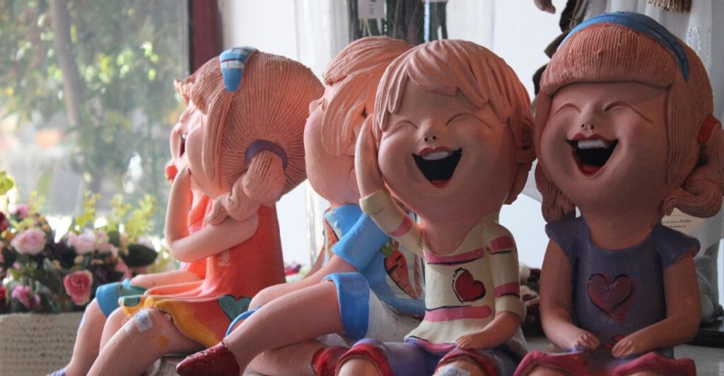 Handmade clay art ornaments with vibrant patterns enhancing a stylish living room space