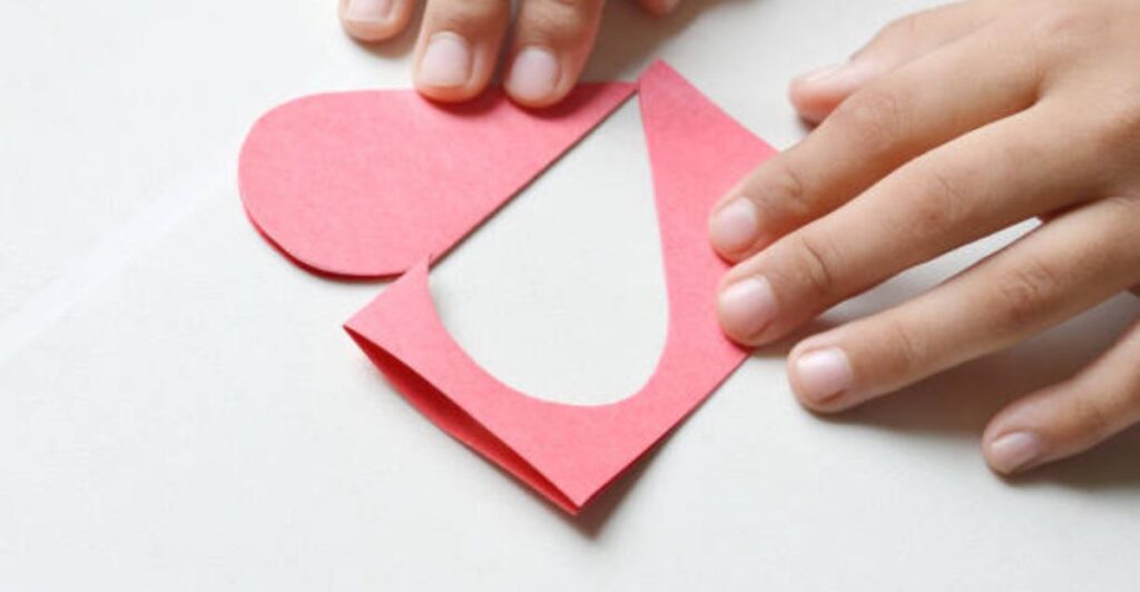 Handmade paper flowers and butterflies displayed for a fun summer craft activity