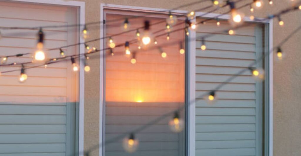 Garden pathway lined with solar string lights for a cozy nighttime atmosphere