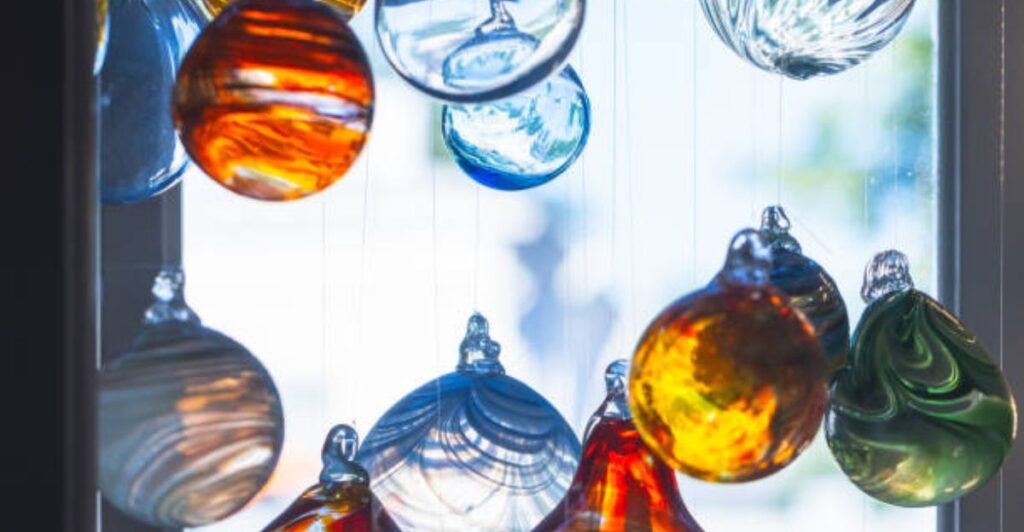 “Add a touch of magic with hand-painted glass orbs 🌸.”