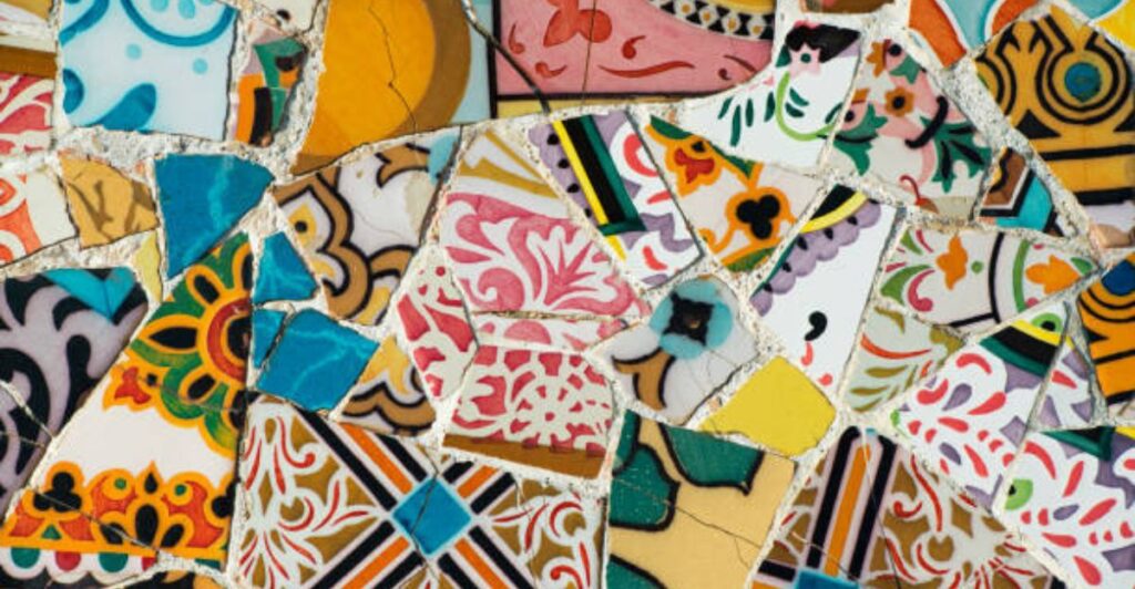 Eco-friendly courtyard décor featuring mosaic patterns made from recycled ceramic tile fragments.