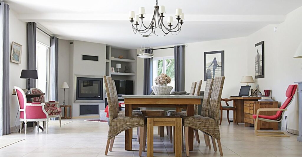 Modern living room featuring a sofa bed and storage coffee table for space-saving functionality.