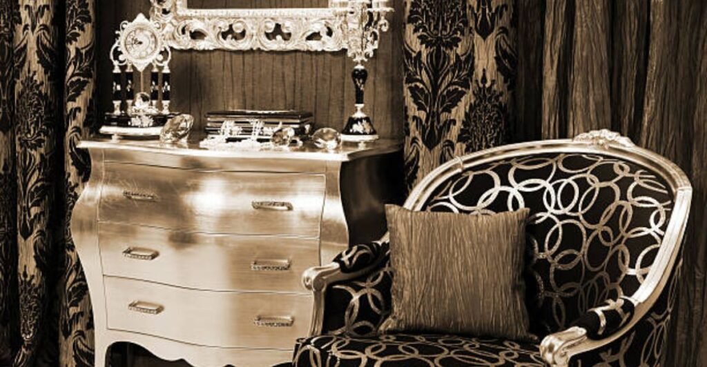 Luxurious velvet sofa with stylish gold accents and home decor