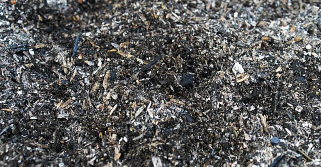 DIY coal peat compost mixture ready to improve garden soil