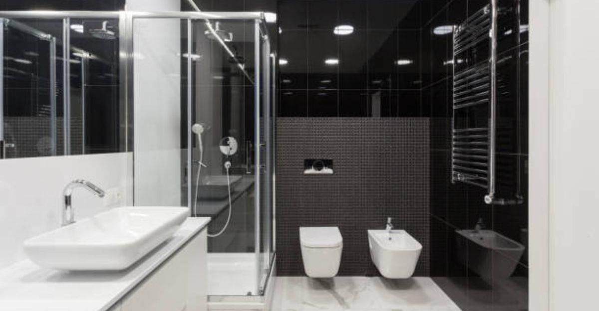 Stylish bedroom divided by a frosted glass partition, creating privacy while enhancing the home's modern design.