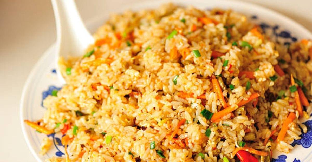 Homemade vegetable fried rice made with fresh mixed vegetables and fluffy long-grain rice.