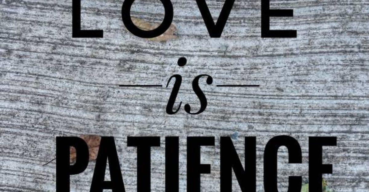 Hands gently supporting a small heart, reflecting patience as the ultimate expression of genuine love.