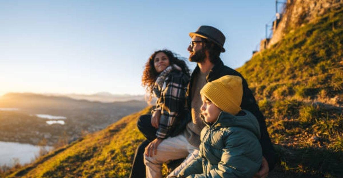 Parents and children smiling together during a scenic family photo session